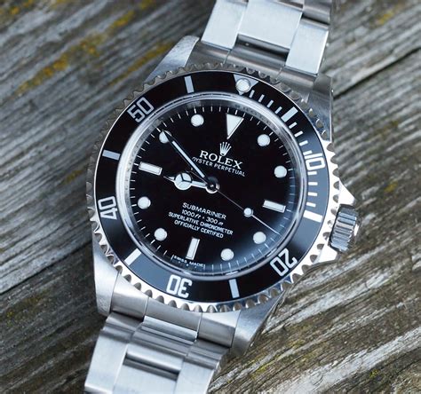 Rolex submariner 14060 vs 14060m